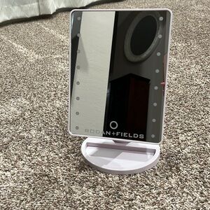 Rodan+Fields stand up mirror.